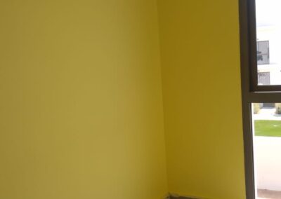 Fresh yellow walls after move-out painting in Dubai